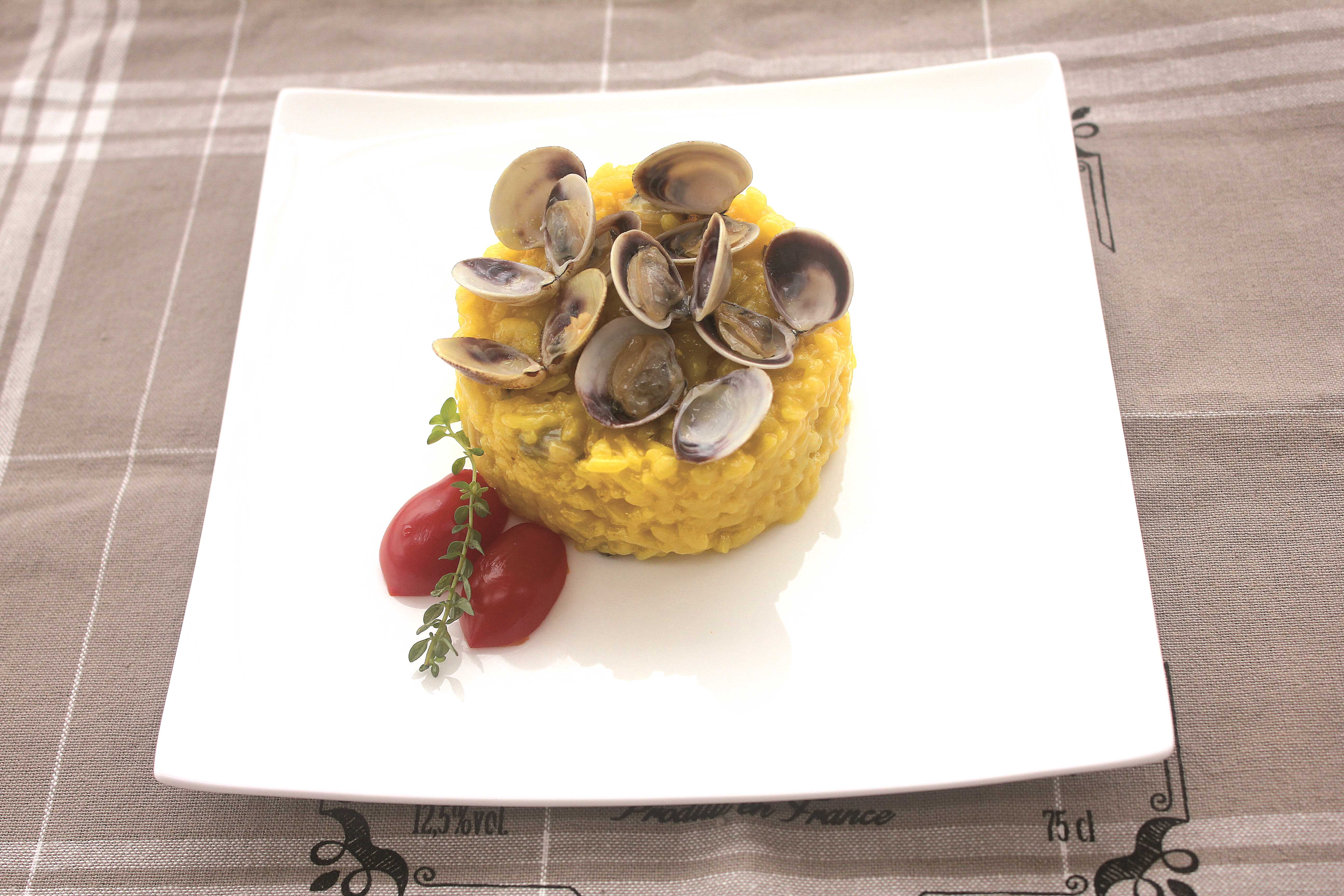 Ricetta Risotto giallo con le vongole con il bimby | Agrodolce